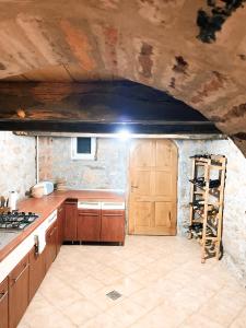 Kuchyň nebo kuchyňský kout v ubytování Toma Guesthouse