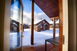 a view from the porch of a house at Perfect Base For Skiing And Local Events in Beitostøl