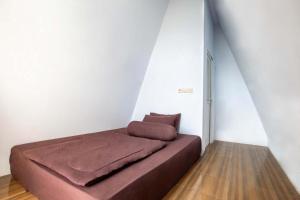 Postel nebo postele na pokoji v ubytování INKA Vilas Sembalun