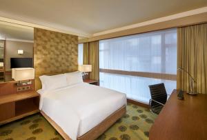 Voodi või voodid majutusasutuse Holiday Inn Golden Mile by IHG toas