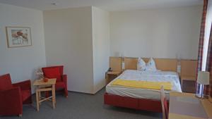 Postel nebo postele na pokoji v ubytování Andi´s Steakhüsli & Hotel