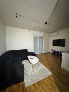 TV a/nebo společenská místnost v ubytování Jednosoban stan Dea