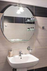 Koupelna v ubytování Scala Hotel