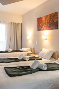 Voodi või voodid majutusasutuse Scala Hotel toas