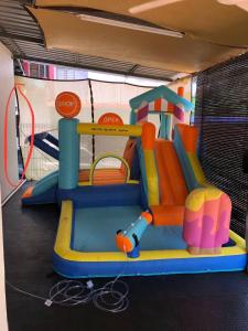 a playset with a bounce at Pulai Bliss Homestay in Pekan Nanas