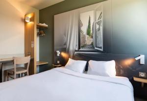 Postel nebo postele na pokoji v ubytování B&B HOTEL Valence TGV Romans + 37 fotografií