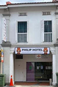 a building with a philip hotel sign on it at Philip Hotel at Little India in Singapore