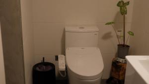 Un baño de Yu Apartment