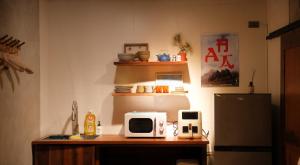 Kuchyň nebo kuchyňský kout v ubytování Yu Apartment