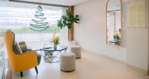Posezení v ubytování Horizon Front Beach Hotel Danang + 26 fotografií
