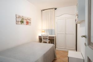 Postel nebo postele na pokoji v ubytování Maestrale Aris - Klodge
