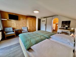 Postel nebo postele na pokoji v ubytování Gästehaus Alpvital
