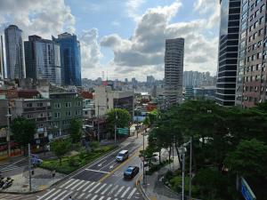 a view of a city with cars on a street at For family group, 4min to Seoul station in Seoul