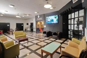 TV a/nebo společenská místnost v ubytování Haifa Tower Hotel - מלון מגדל חיפה