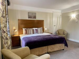 Postel nebo postele na pokoji v ubytování The Windermere Hotel, London