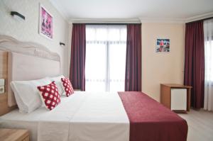 Postel nebo postele na pokoji v ubytování Artefes Hotel Old City