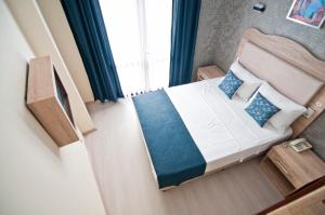 Postel nebo postele na pokoji v ubytování Artefes Hotel Old City