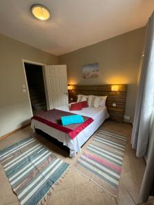 Postel nebo postele na pokoji v ubytování West Riviera - Centrally located apartment close to the beach with breakfast