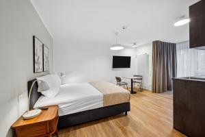 Voodi või voodid majutusasutuse Limehome Karlsruhe Sophienstr toas