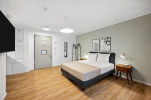 Voodi või voodid majutusasutuse Limehome Karlsruhe Sophienstr toas