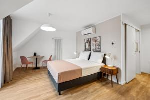 Voodi või voodid majutusasutuse Limehome Karlsruhe Sophienstr toas