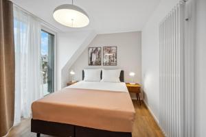 Voodi või voodid majutusasutuse Limehome Karlsruhe Sophienstr toas