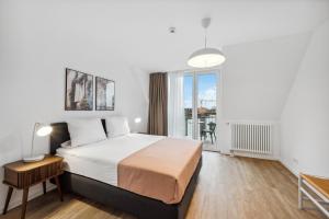Voodi või voodid majutusasutuse Limehome Karlsruhe Sophienstr toas