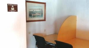 Uma área de estar em Hotel Santo Andre