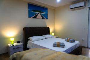 Postel nebo postele na pokoji v ubytování B&B Suite Penelope + 16 fotografií