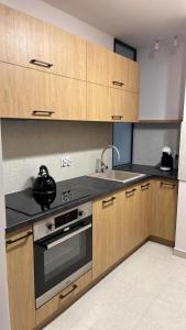 Η κουζίνα ή μικρή κουζίνα στο Apartament Kąpielowa