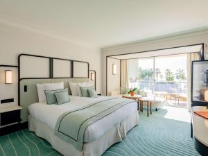 Cama ou camas em um quarto em Mondrian Cannes