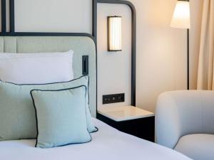 Cama ou camas em um quarto em Mondrian Cannes