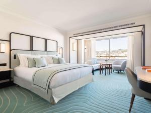 Cama ou camas em um quarto em Mondrian Cannes