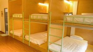 Postel nebo postele na pokoji v ubytování Leaf Sustainable Hostel