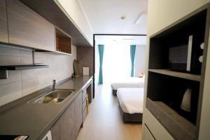 Postel nebo postele na pokoji v ubytování Wellstay hotel Incheon