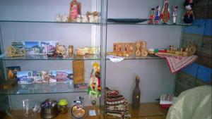 a shelf filled with lots of items in a room at Hostel Alex 1 in Sofia