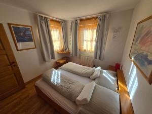 Posteľ alebo postele v izbe v ubytovaní Landhaus Feldingweg