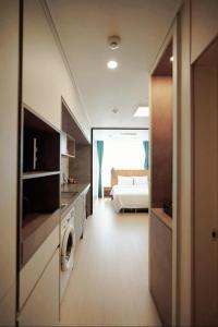 Postel nebo postele na pokoji v ubytování Wellstay hotel Incheon