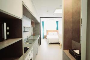Postel nebo postele na pokoji v ubytování Wellstay hotel Incheon