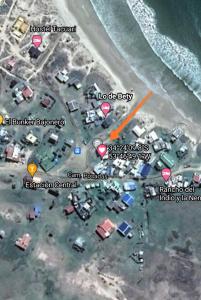 a map of a parking lot next to the ocean at Tiny House in Cabo Polonio