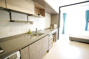 Kuchyň nebo kuchyňský kout v ubytování Wellstay hotel Incheon