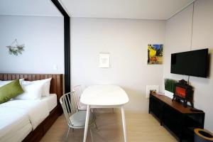TV a/nebo společenská místnost v ubytování Wellstay hotel Incheon