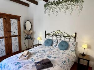 Ένα ή περισσότερα κρεβάτια σε δωμάτιο στο Descanso de las hadas