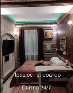 TV a/nebo společenská místnost v ubytování Bogdanov Yar Hotel