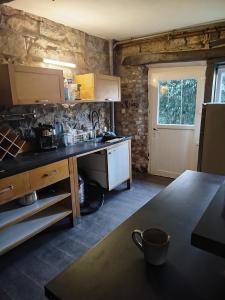 Kuchyň nebo kuchyňský kout v ubytování Maison knel