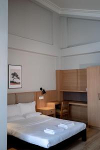 Postel nebo postele na pokoji v ubytování MidlandNest Kohima