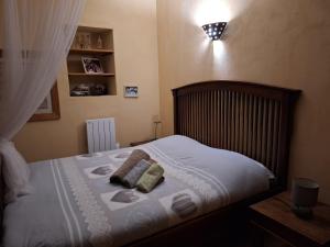 Posteľ alebo postele v izbe v ubytovaní Mas Chamarel à Sanary-sur-Mer au milieu des vignes et oliviers