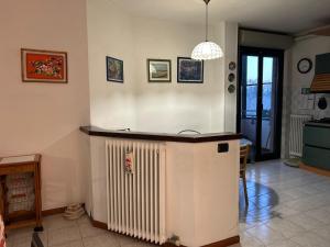 Kuchyň nebo kuchyňský kout v ubytování Accogliente Stanza Privata con Bagno Privato - Daniele's House
