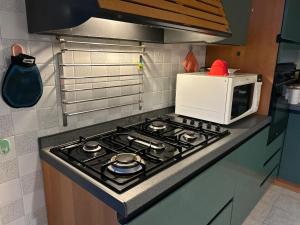 Kuchyň nebo kuchyňský kout v ubytování Accogliente Stanza Privata con Bagno Privato - Daniele's House + 6 fotografií