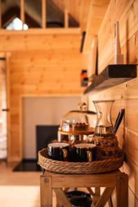 a tray of pots and pans on a table in a kitchen at Forestic Lietuva in Vilionys